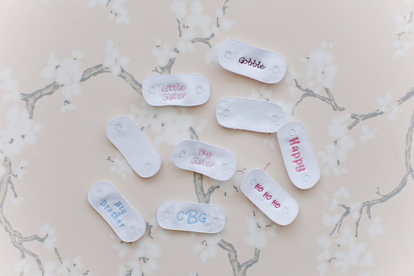 Add embroidery to your tabs (one per tab)